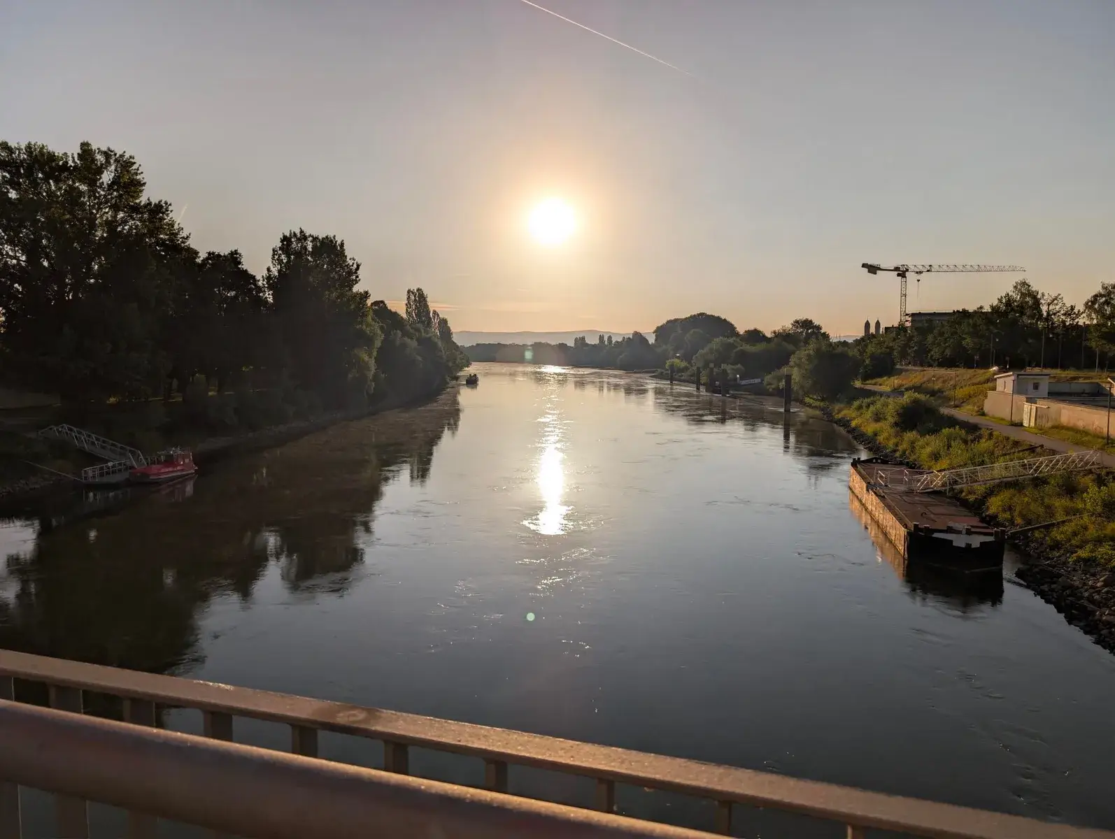 The low sun reflected in a calm river