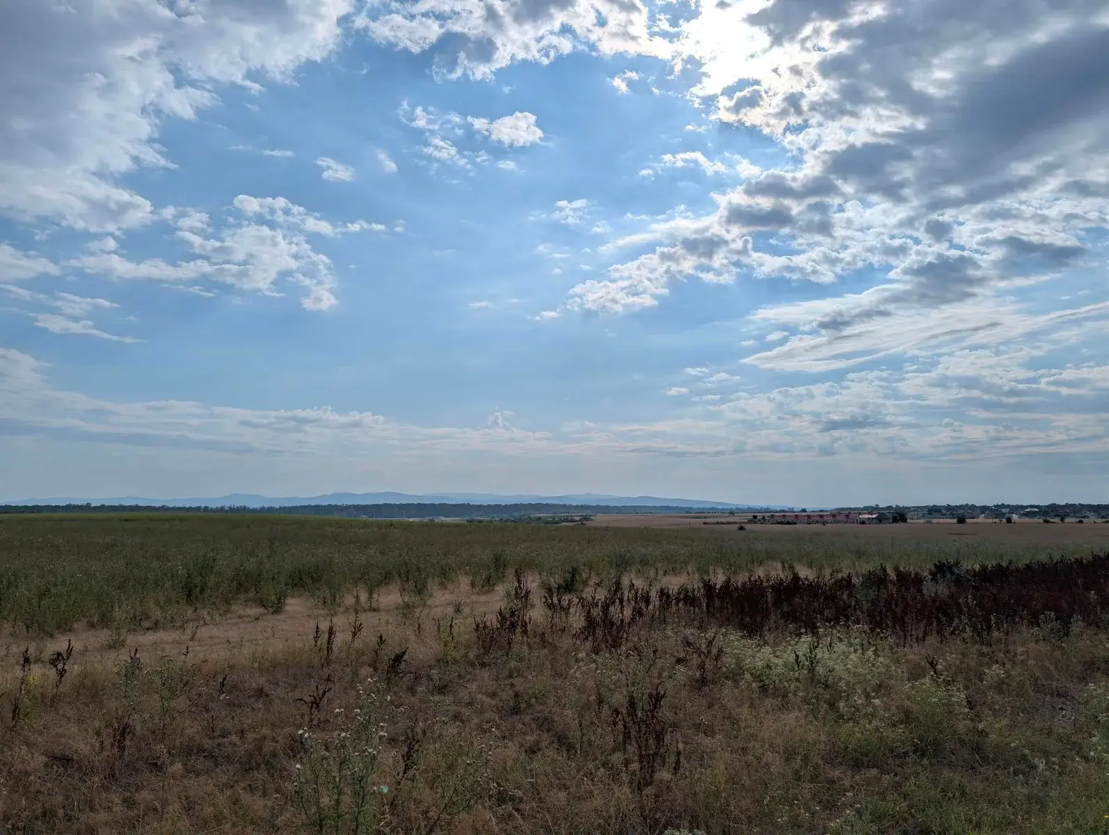 Open plains stretching towards distant hills
