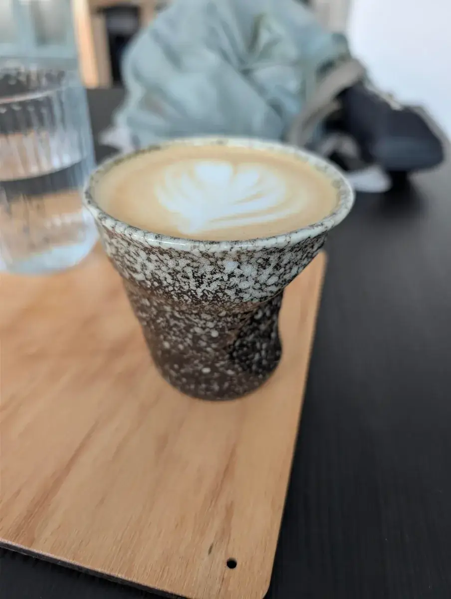 A cup of coffee on a café table
