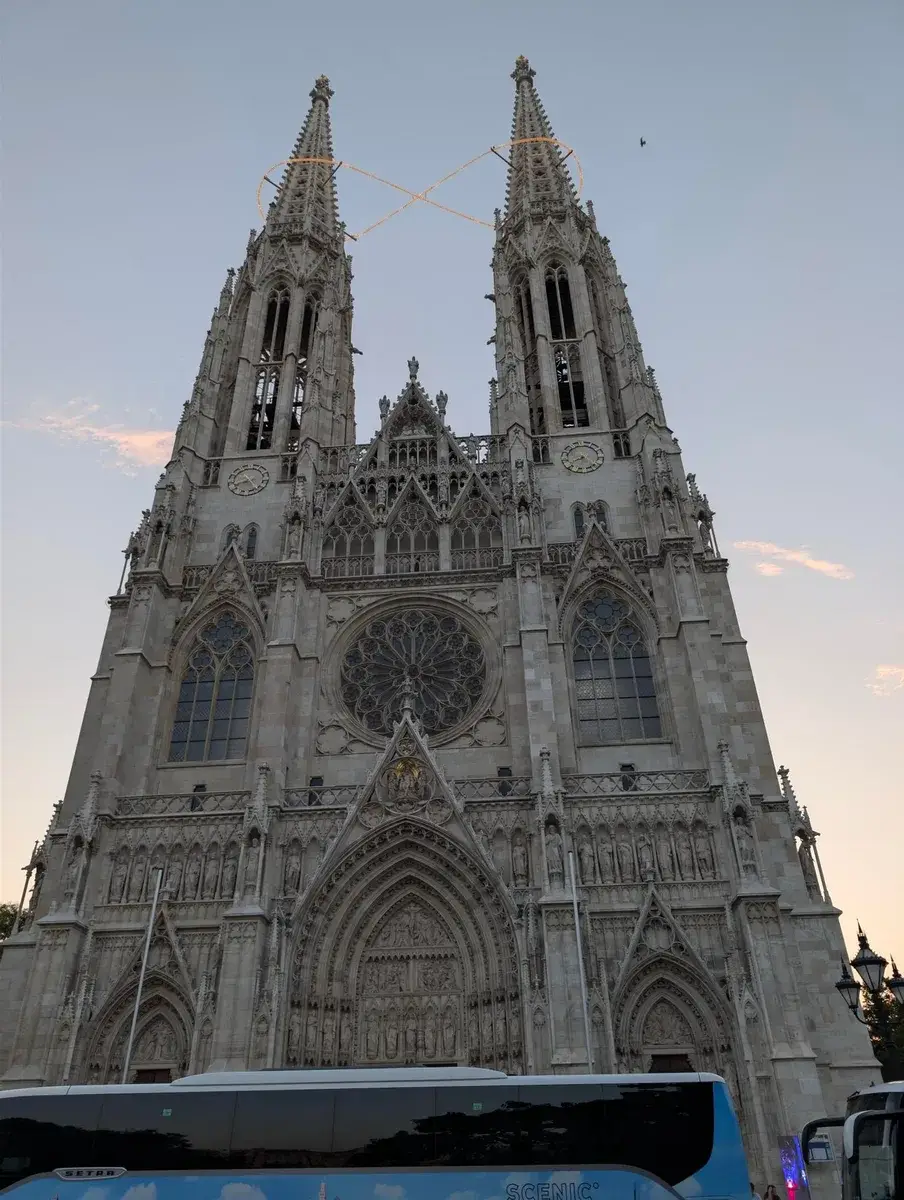 The ornate twin towers of a Gothic cathedral