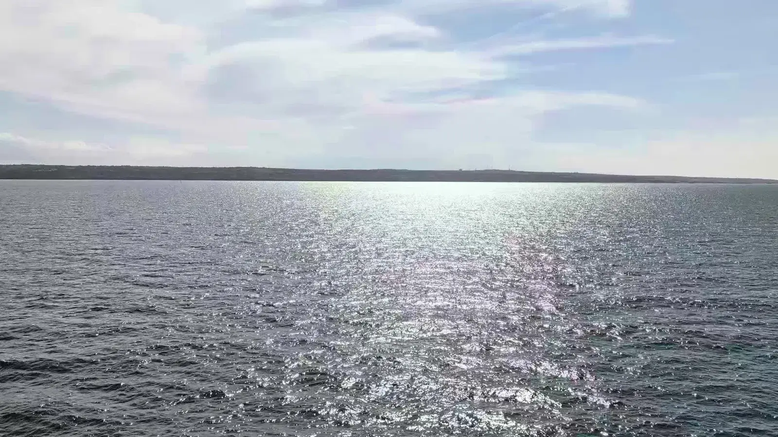 Sunlight glittering across the open sea